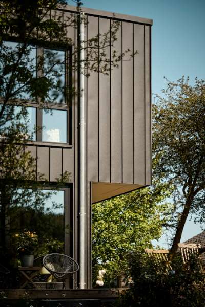 Architect pays attention to the details in a villa with a natural view and façade cladding in steel and stone, Konsul Lorenzen Straße 5, 24376 Kappeln, Germany